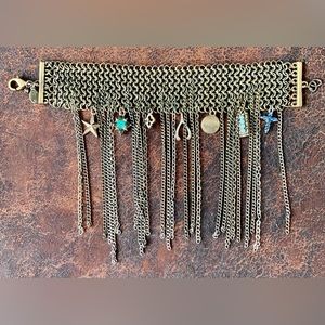 Vintage Gold tone Chain Mail Bracelet with charms and chains.